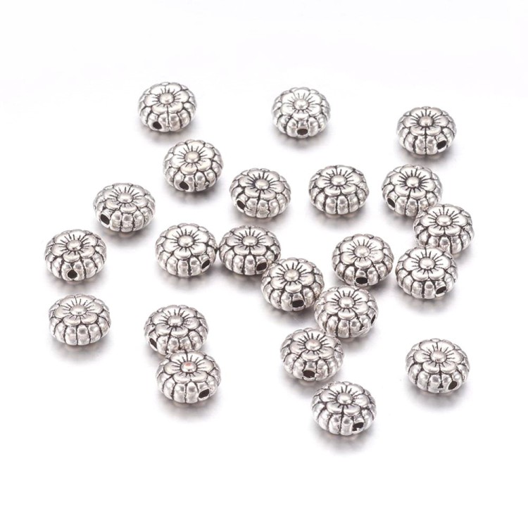 PRM647 Przekładka metalowa kwiatek kwiatuszek 7x3,5mm stare srebro