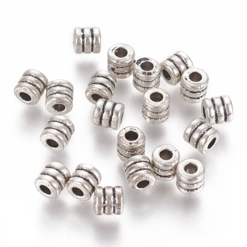 PRM649 Przekładka metalowa ozdobna walec 4x3,9mm 10szt stare srebro
