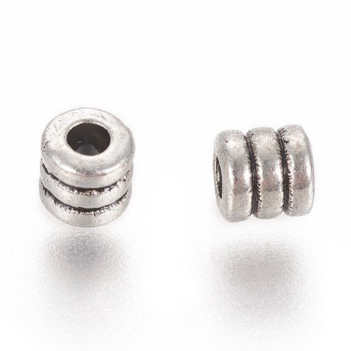 PRM649 Przekładka metalowa ozdobna walec 4x3,9mm 10szt stare srebro