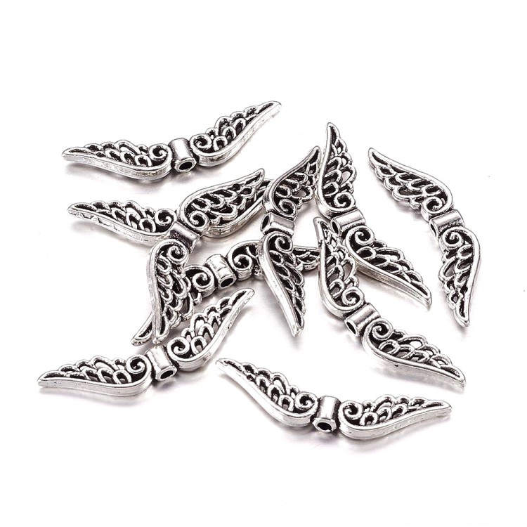 PRM656 Przekładka metalowa ozdobna skrzydła skrzydełka 30x8mm 2szt stare srebro