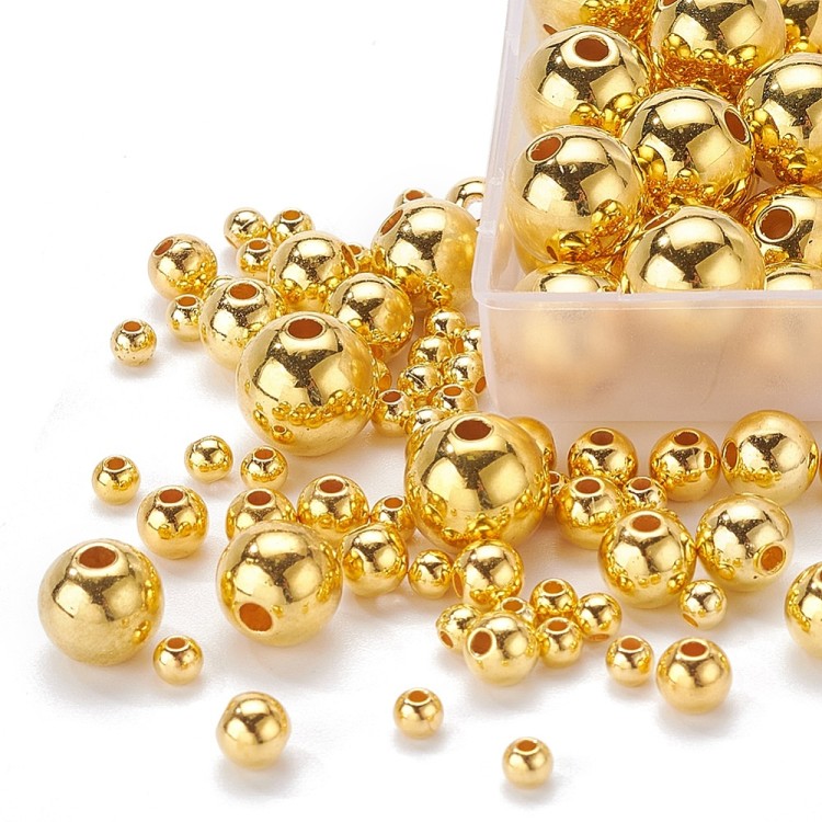 ZKOR53 Zestaw koraliki przekładki plastikowe powlekane CCB 497szt złote