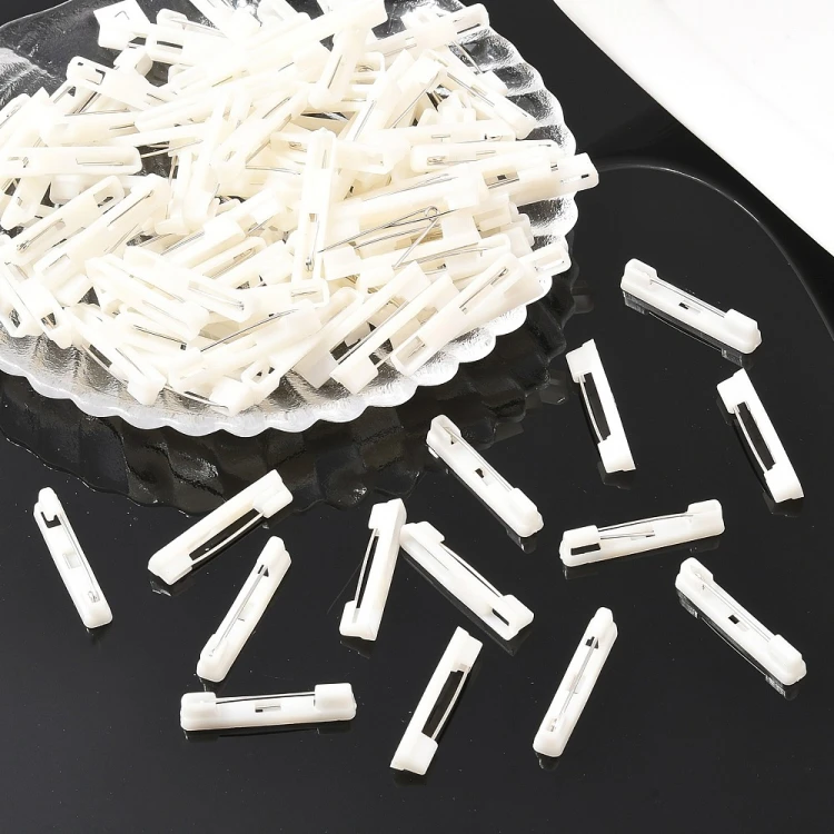 BBR51 Baza zapięcie do broszki przypinki broszka 5,5x31mm plastikowa 10szt