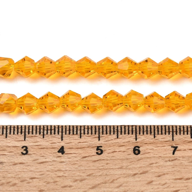 BIC207 Koraliki szklane szlifowane bicone 6mm kryształki sznur 45szt pomarańczowe