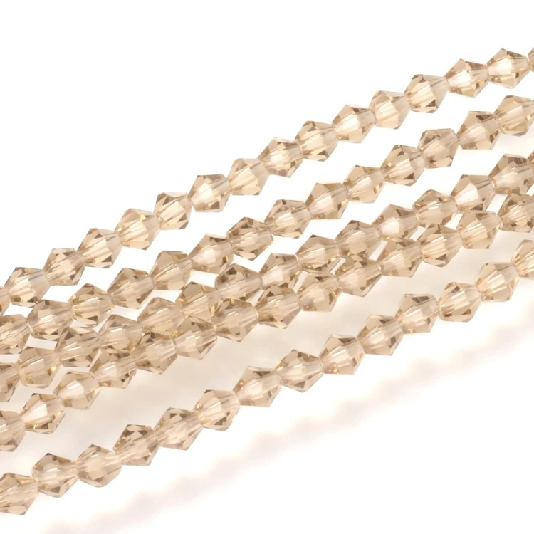 BIC206 Koraliki szklane szlifowane bicone 6mm kryształki sznur 45szt j.brzoskwiniowe