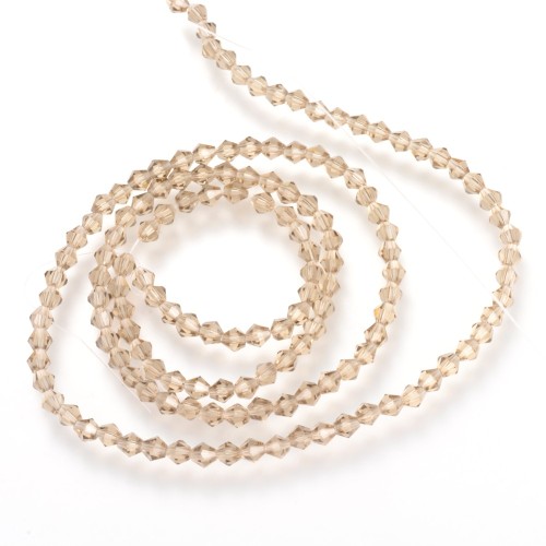 BIC206 Koraliki szklane szlifowane bicone 6mm kryształki sznur 45szt j.brzoskwiniowe