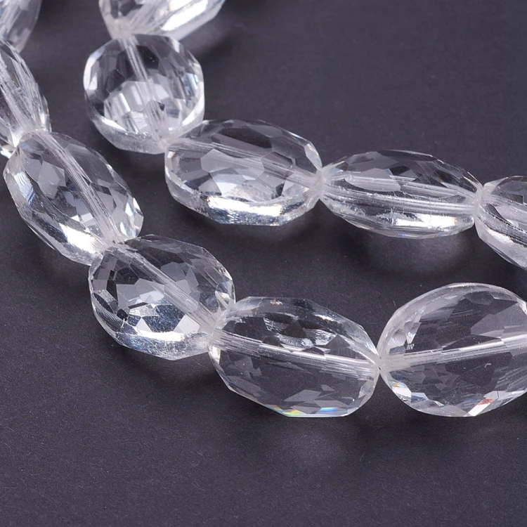 KSF156 Koraliki szklane fasetowane owalne 12x16mm sznur 20szt crystal