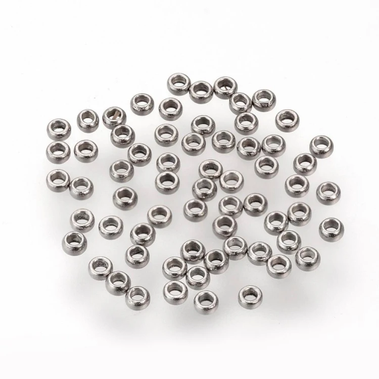 kpm55 Koraliki kuleczki przekładki 1,5x0,9mm 20szt stal nierdzewna