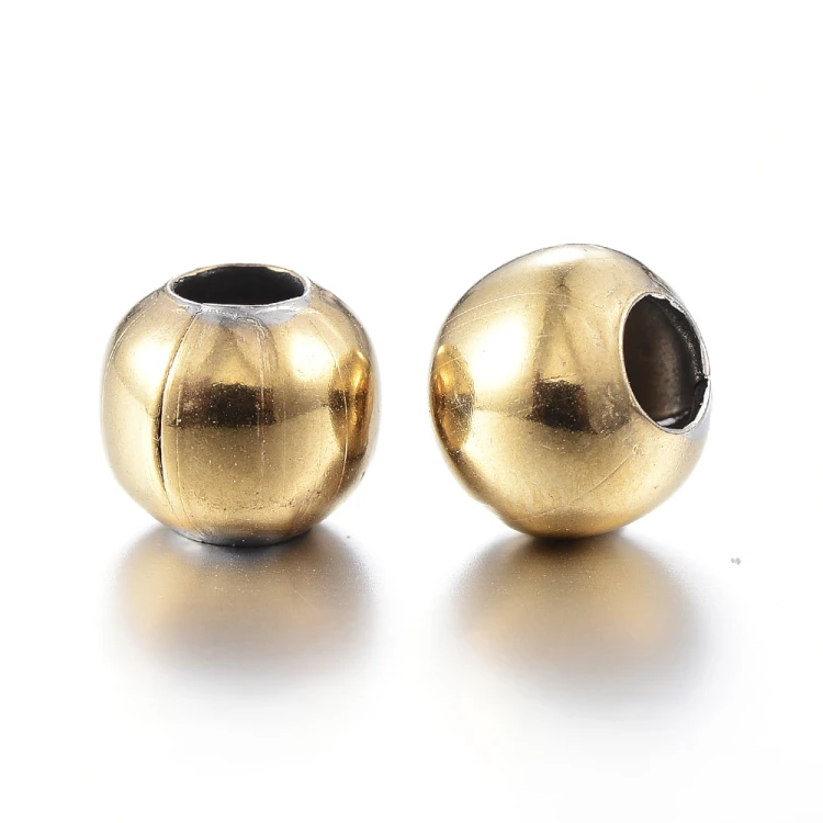 kpm59 Koraliki kuleczki przekładki 4x3,5mm 10szt stal nierdzewna IP złote 18K
