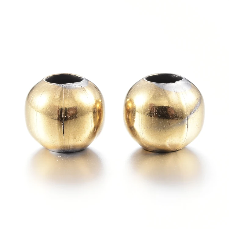 kpm59 Koraliki kuleczki przekładki 4x3,5mm 10szt stal nierdzewna IP złote 18K