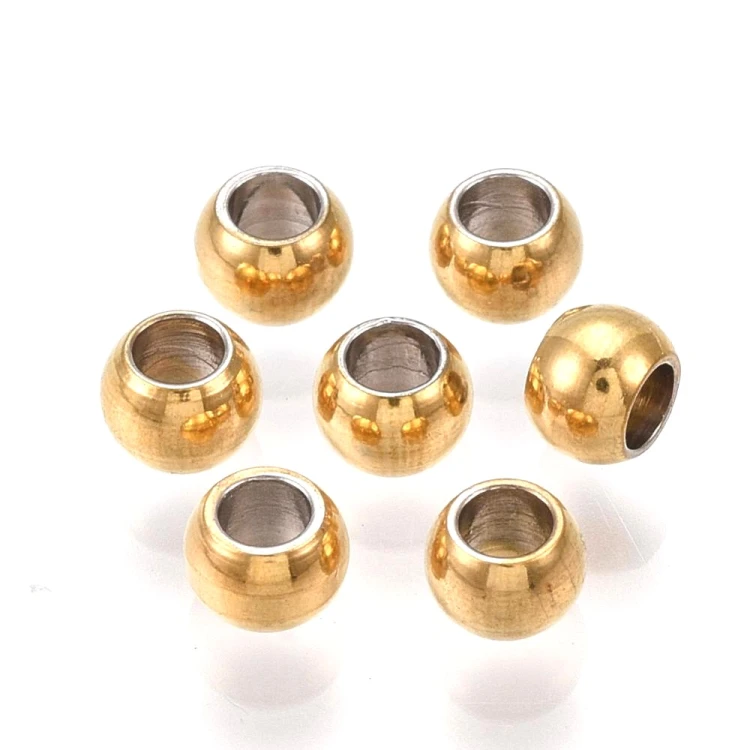 kpm60 Koraliki kuleczki przekładki 4x3mm 10szt stal nierdzewna PVD złote 18K