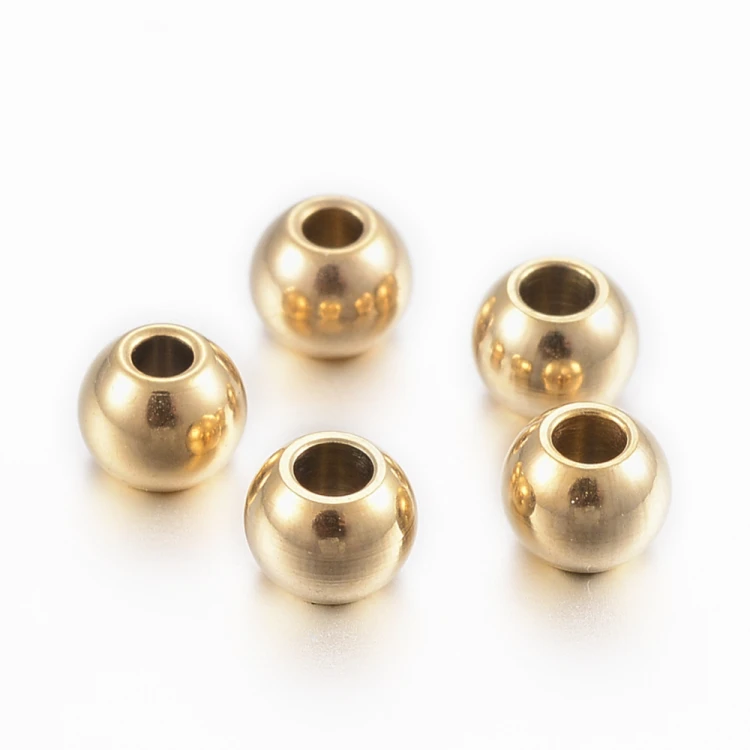 kpm61 Koraliki kuleczki przekładki 4x3,3mm 5szt stal nierdzewna IP złote