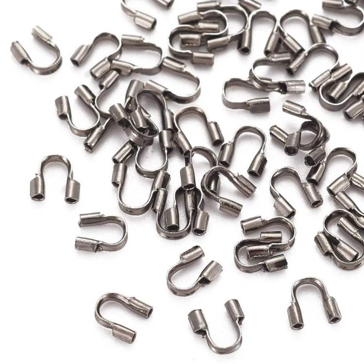 KRZ135 Zakończenia ochronne linki 0,7mm podkówki 4x4,5mm 20szt z mosiądzu grafitowe