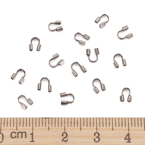 KRZ135 Zakończenia ochronne linki 0,7mm podkówki 4x4,5mm 20szt z mosiądzu grafitowe