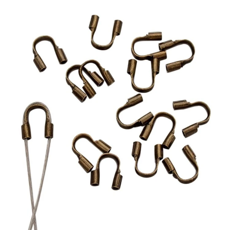 KRZ136 Zakończenia ochronne linki 0,5mm podkówki z mosiądzu 4x4,5mm 20szt mosiężne