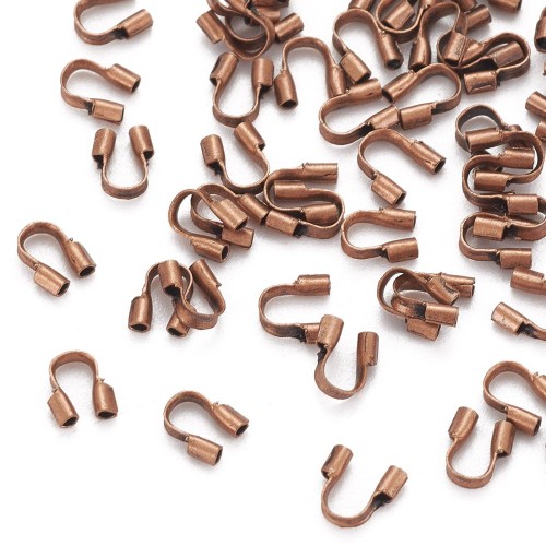 KRZ136 Zakończenia ochronne linki 0,5mm podkówki z mosiądzu 4x4,5mm 20szt miedziane